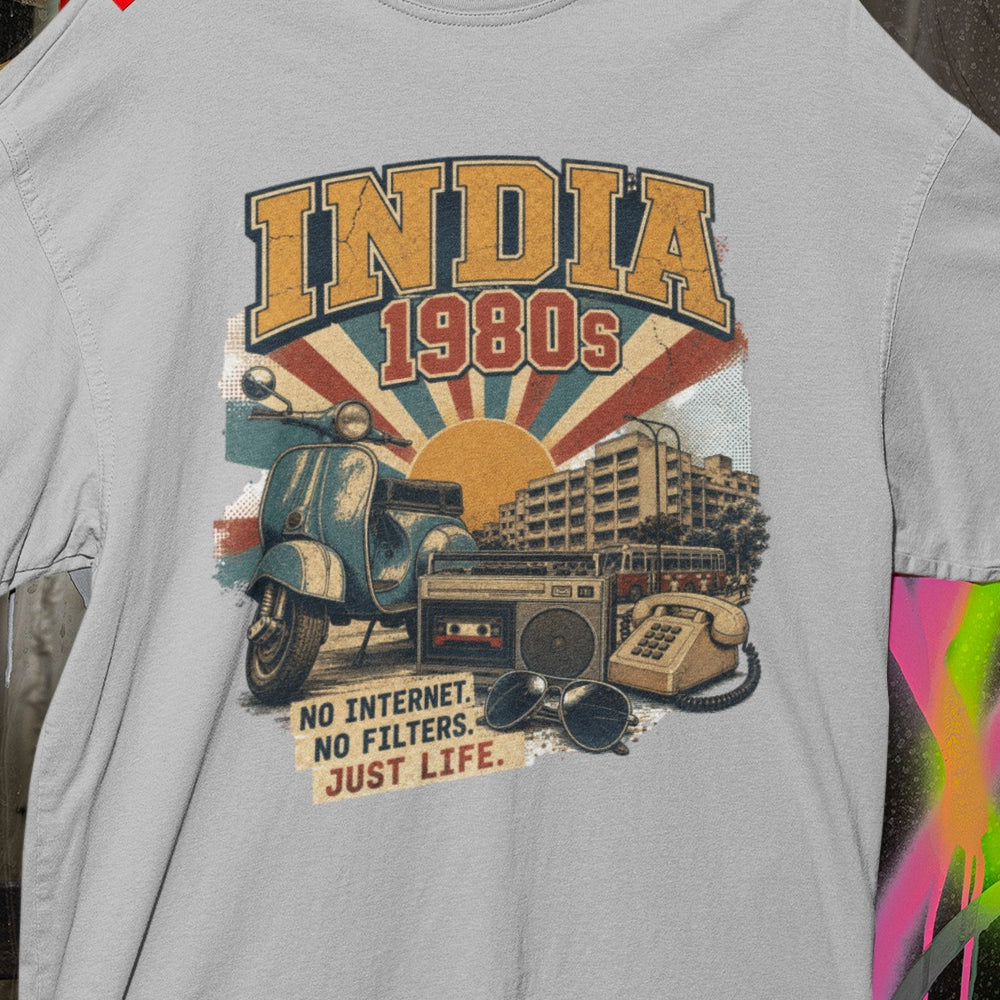 Close-up of the INDIA 1980s print on the Melange Grey oversized t-shirt – retro sunburst, scooter, boombox and No Internet No Filters Just Life slogan