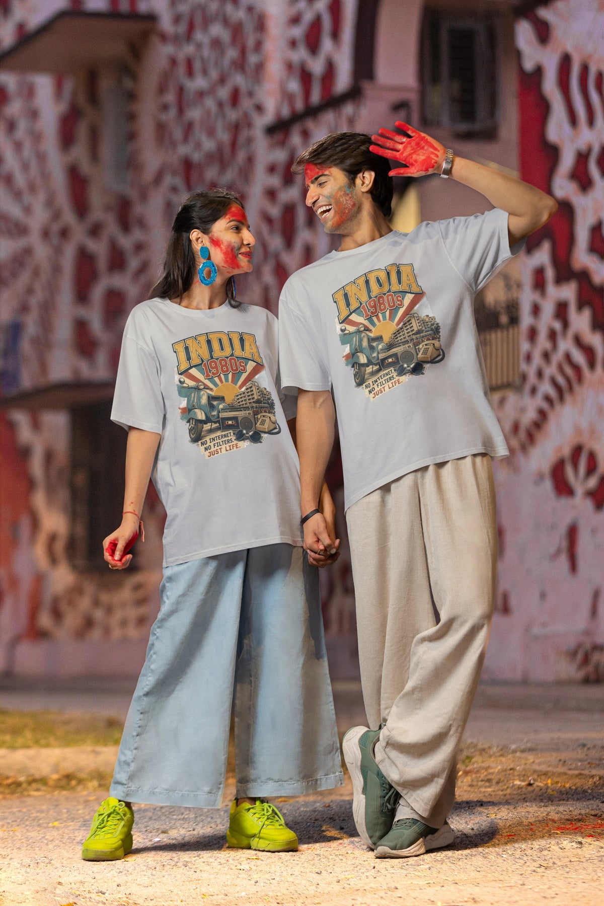 Couple wearing the India 80s retro oversized t-shirt in Melange Grey – relaxed unisex oversized fit