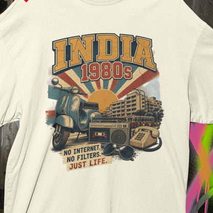 Close-up of the INDIA 1980s print on the Off white oversized t-shirt – vintage scooter, cassette player, rotary phone and No Internet No Filters Just Life slogan