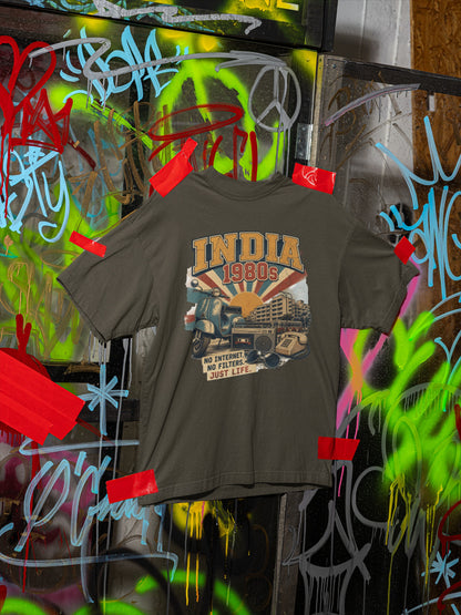 Olive Green India 80s retro oversized t-shirt flat front view against street graffiti