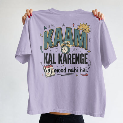 Lavender Nauma oversized t-shirt, front view, featuring 'Kaam Kal Karenge' typography and doodle graphic.