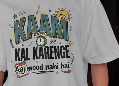 Melange grey Nauma oversized t-shirt design close-up of 'Kaam Kal Karenge' typography and doodle art.