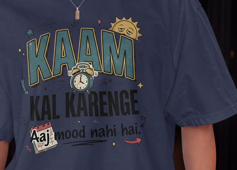 Navy blue Nauma oversized t-shirt design close-up of 'Kaam Kal Karenge' typography and doodle artwork.
