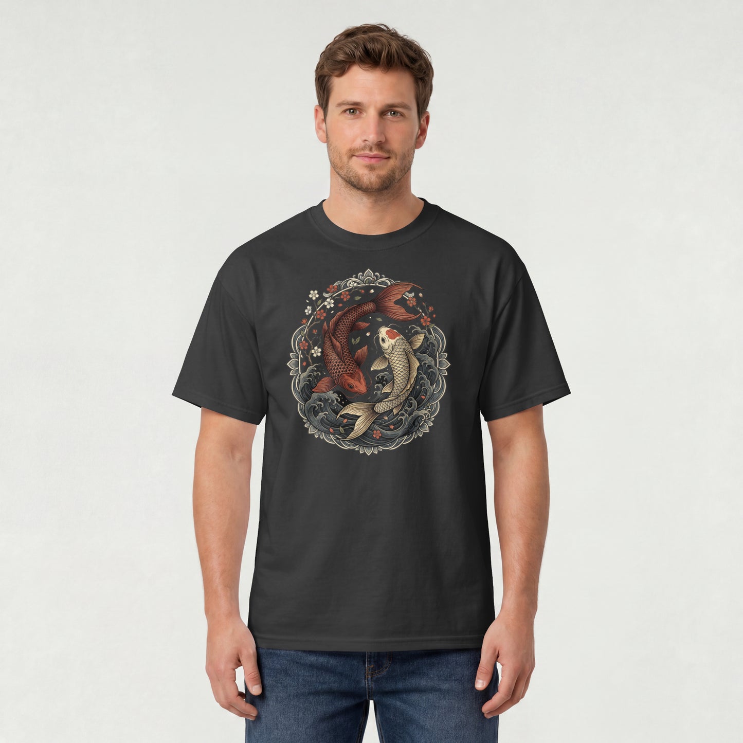Man wearing Nauma black koi fish yin yang graphic cotton T-shirt, front view