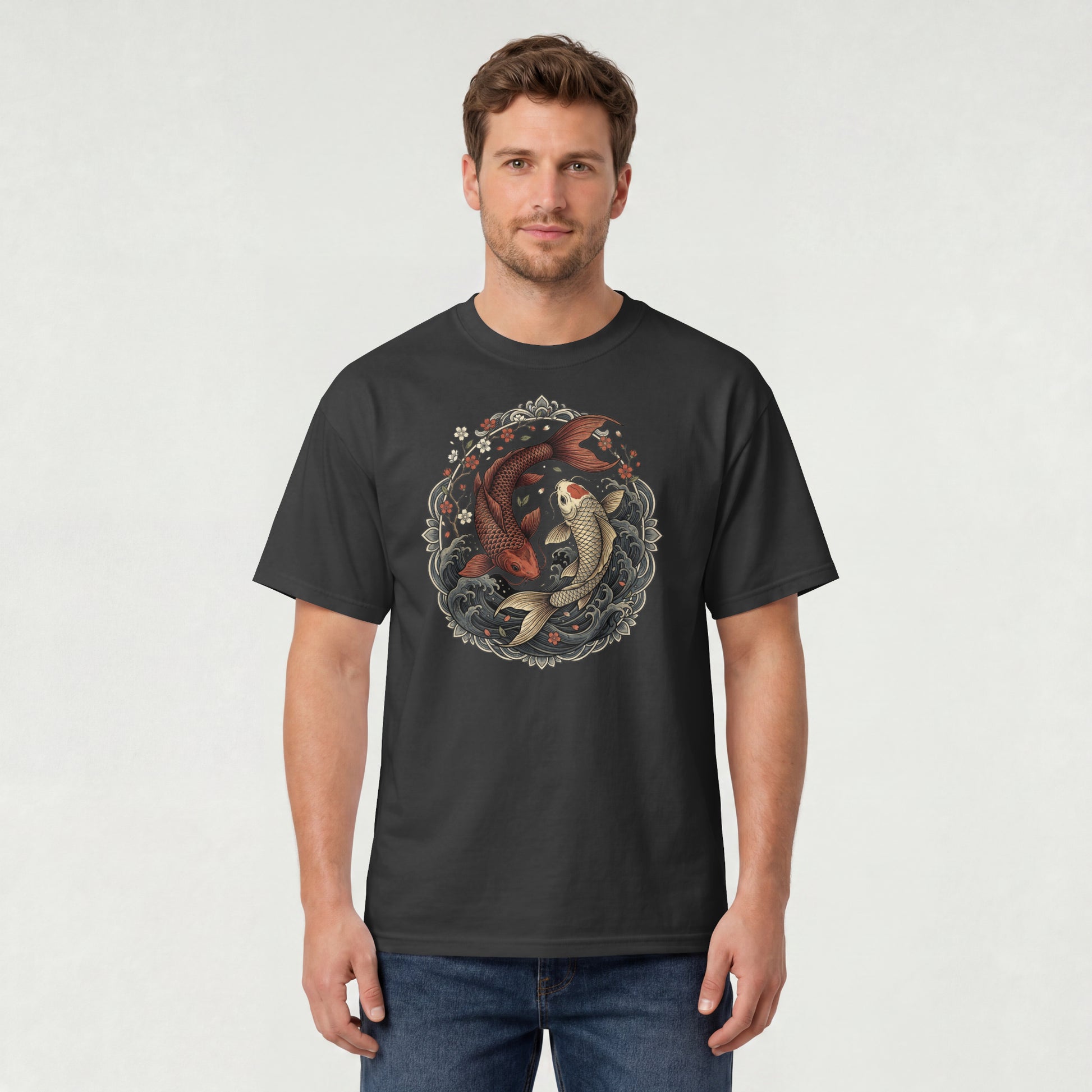 Man wearing Nauma black koi fish yin yang graphic cotton T-shirt, front view