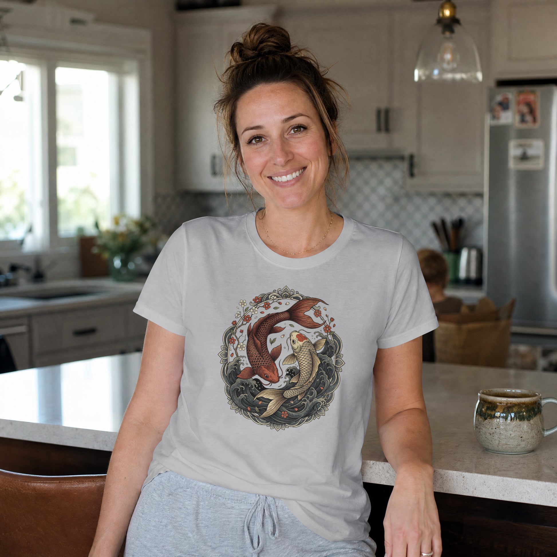Woman wearing Nauma melange grey koi fish yin yang graphic cotton T-shirt, front view