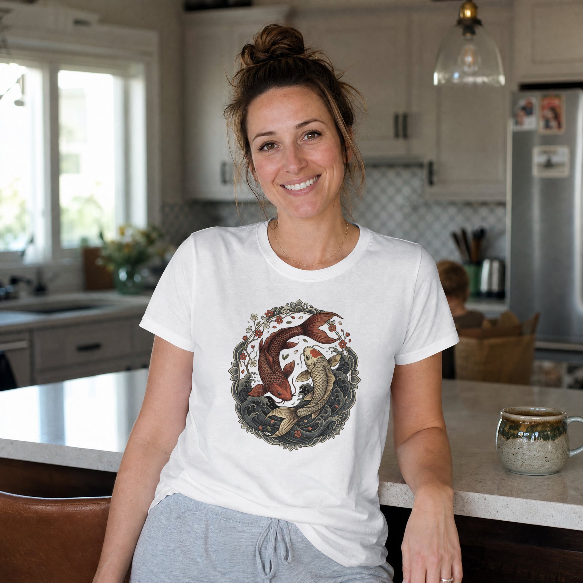 Woman wearing Nauma white koi fish yin yang graphic cotton T-shirt, front view