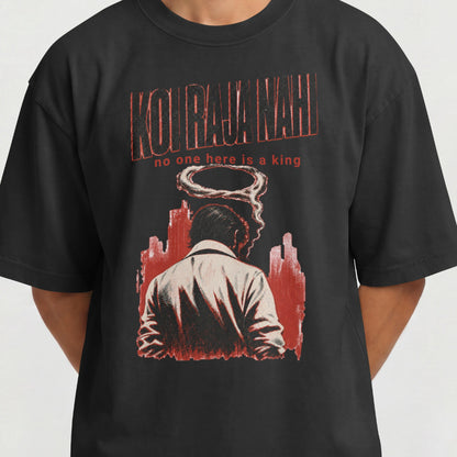 Close-up of the Koi Raja Nahi print on a black oversized t-shirt, showing the halftone texture and red keyline