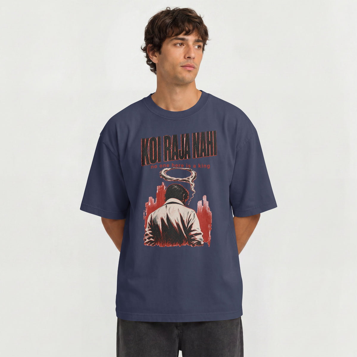 Man wearing the navy blue Koi Raja Nahi oversized streetwear t-shirt