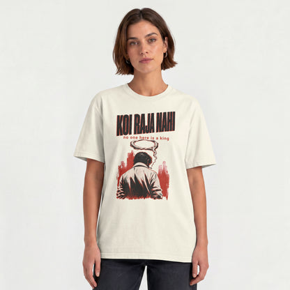 Woman wearing the off white Koi Raja Nahi unisex oversized Hinglish graphic tee