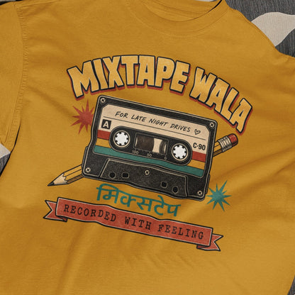 Mustard Yellow Mixtape Wala oversized t-shirt, close-up of the retro cassette print with Hindi मिक्सटेप text and Recorded With Feeling banner