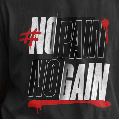 Close-up of the No Pain No Gain print on a black oversized T-shirt, distressed white and red gym typography