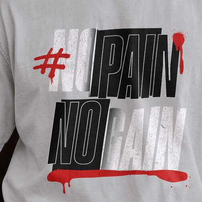 Close-up of the No Pain No Gain graphic on a melange grey oversized T-shirt, layered black and white type with red drip accents