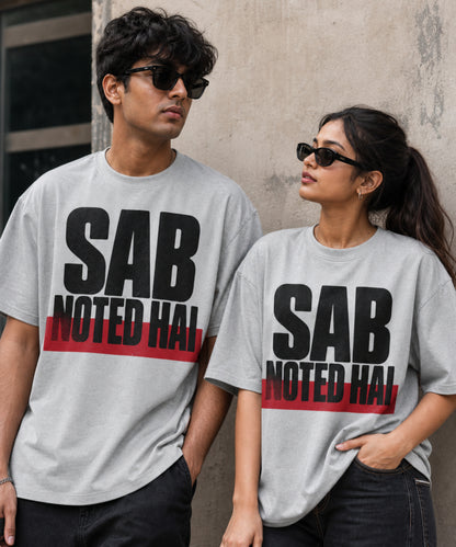 Melange Grey Sab Noted Hai meme oversized t-shirt on male and female models
