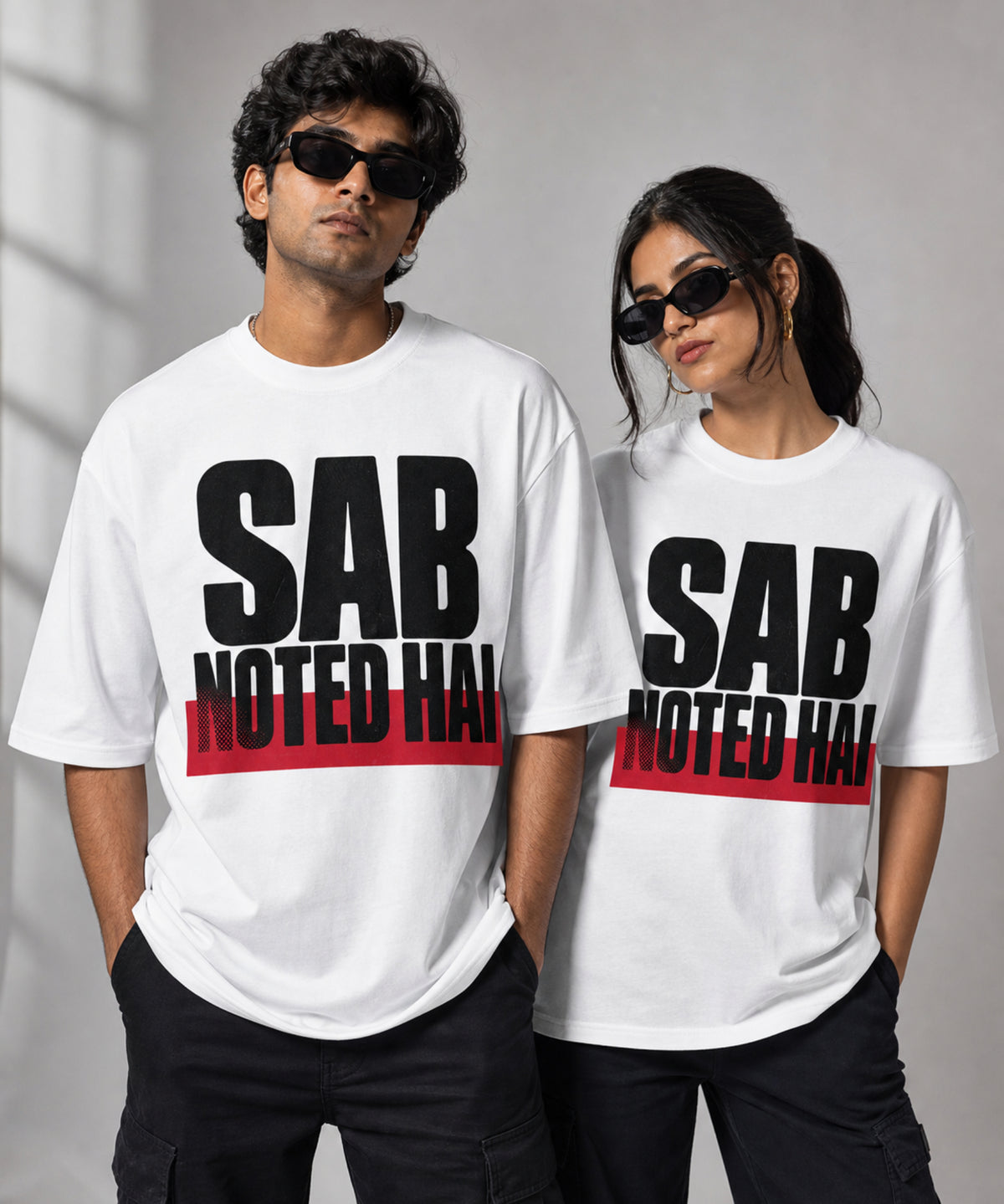 White Sab Noted Hai meme oversized t-shirt on male and female models