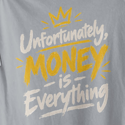 Melange Grey Unfortunately Money Is Everything oversized T-shirt back print close-up – light brush-script slogan with MONEY in mustard yellow under a gold crown