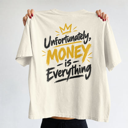 Off white Unfortunately Money Is Everything oversized T-shirt held up to show the dark back slogan print with MONEY in mustard yellow